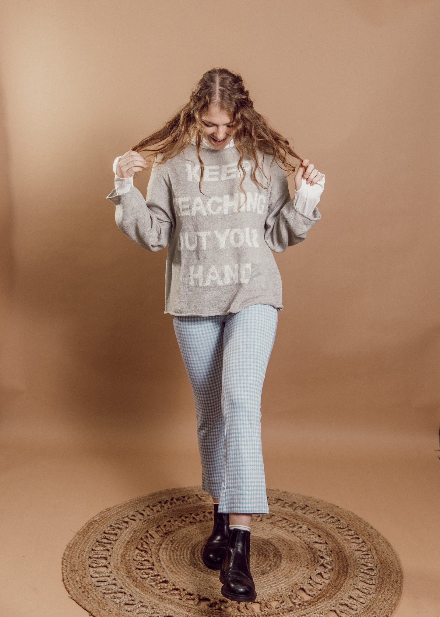 keep reaching out your hand sweater
