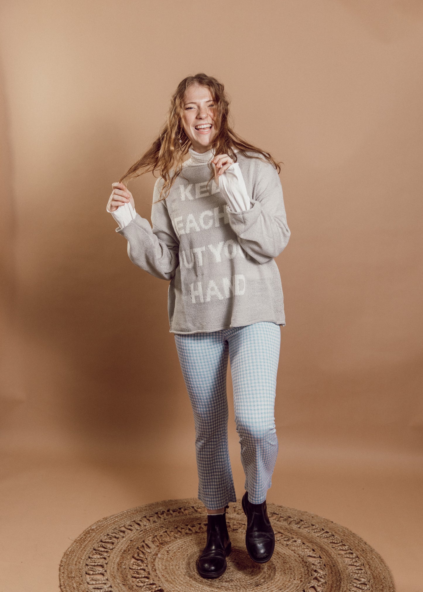 keep reaching out your hand sweater