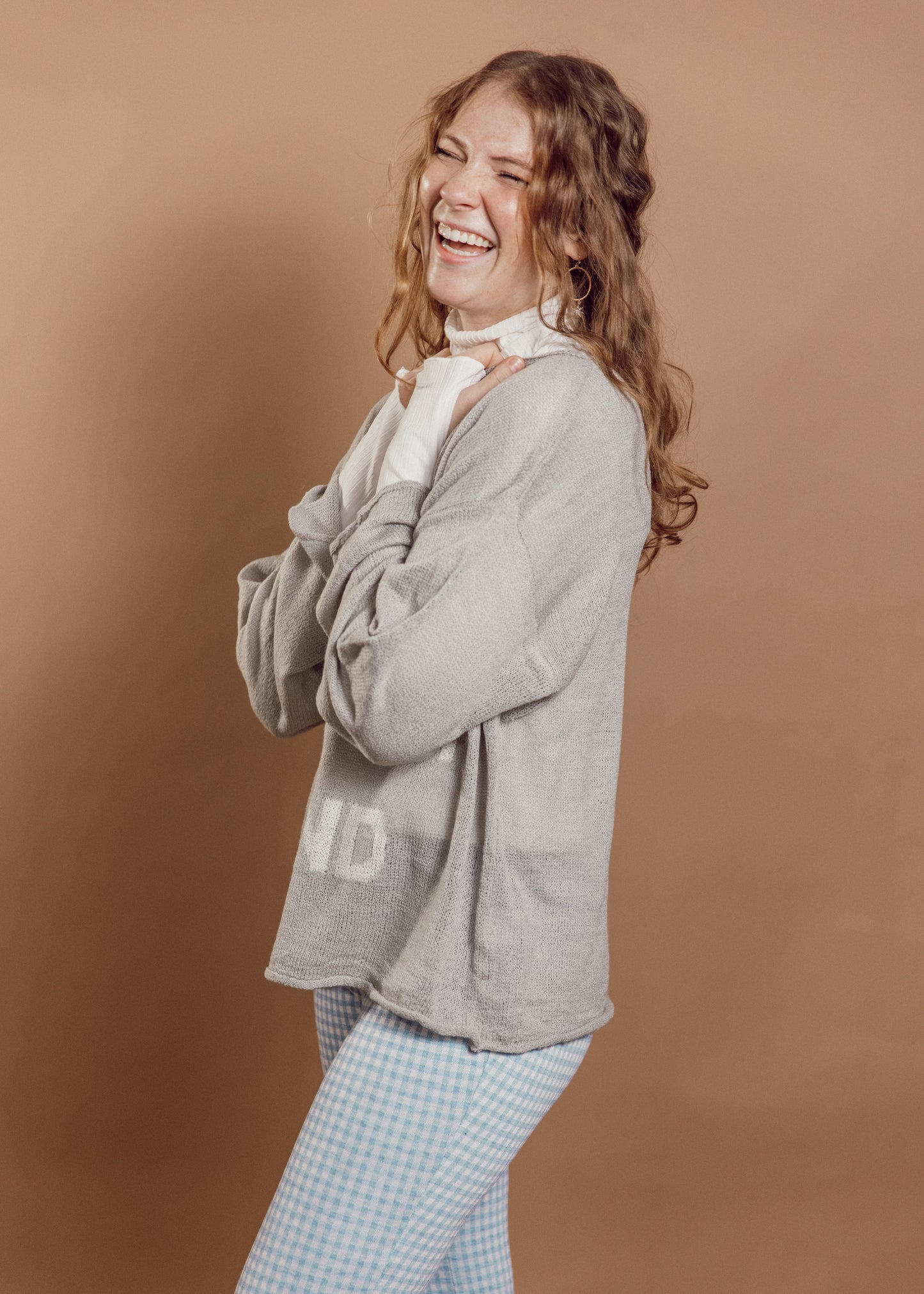 keep reaching out your hand sweater