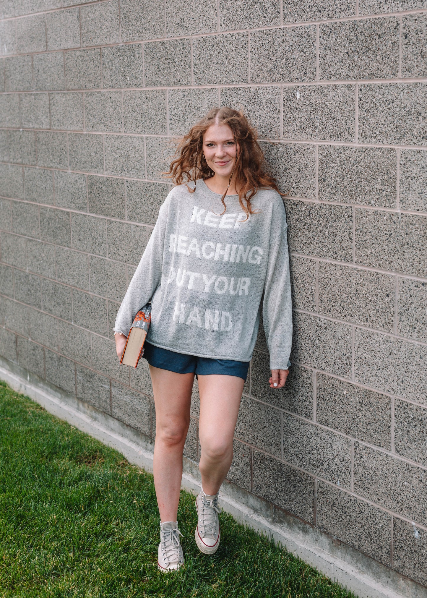 keep reaching out your hand sweater