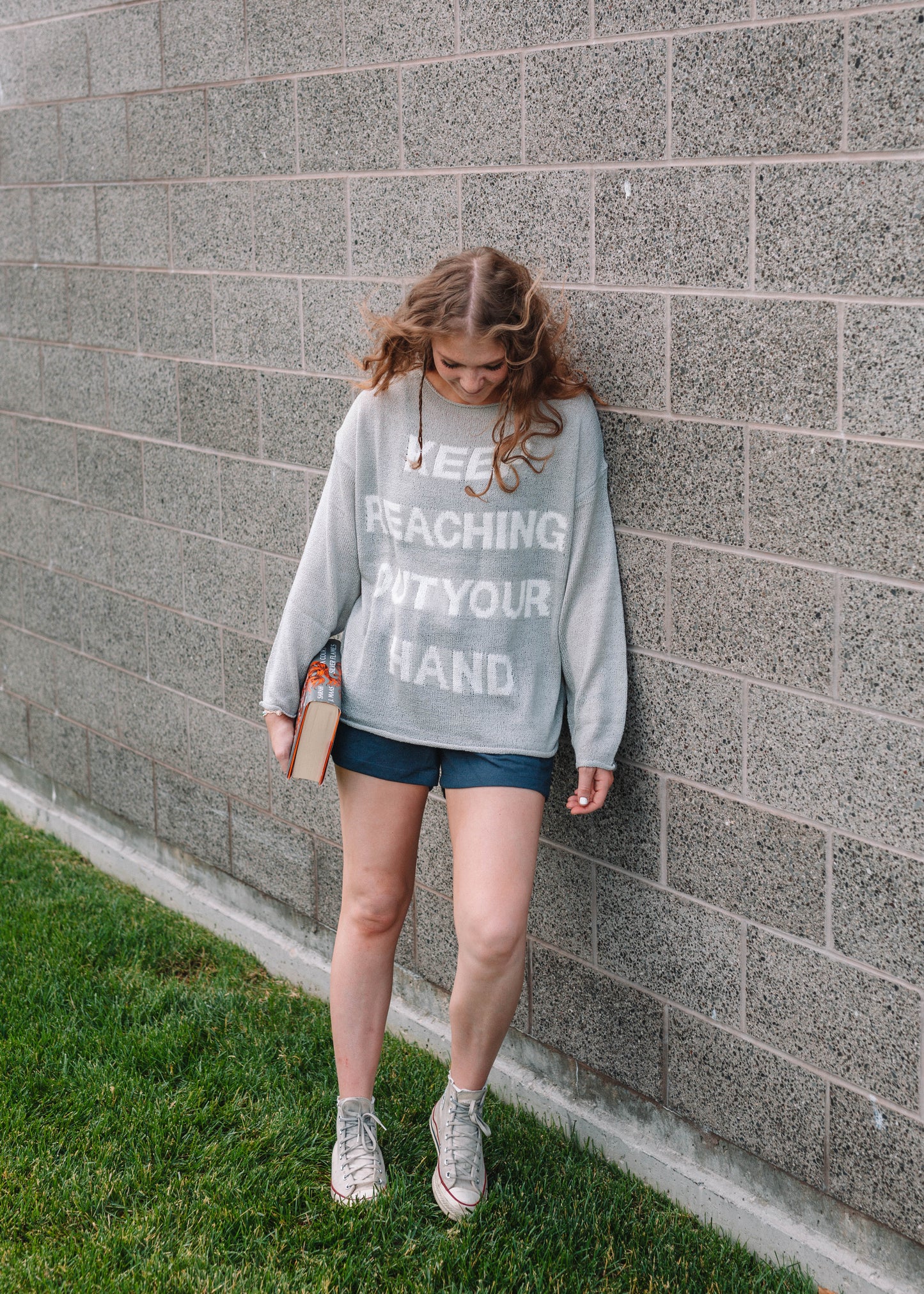 keep reaching out your hand sweater