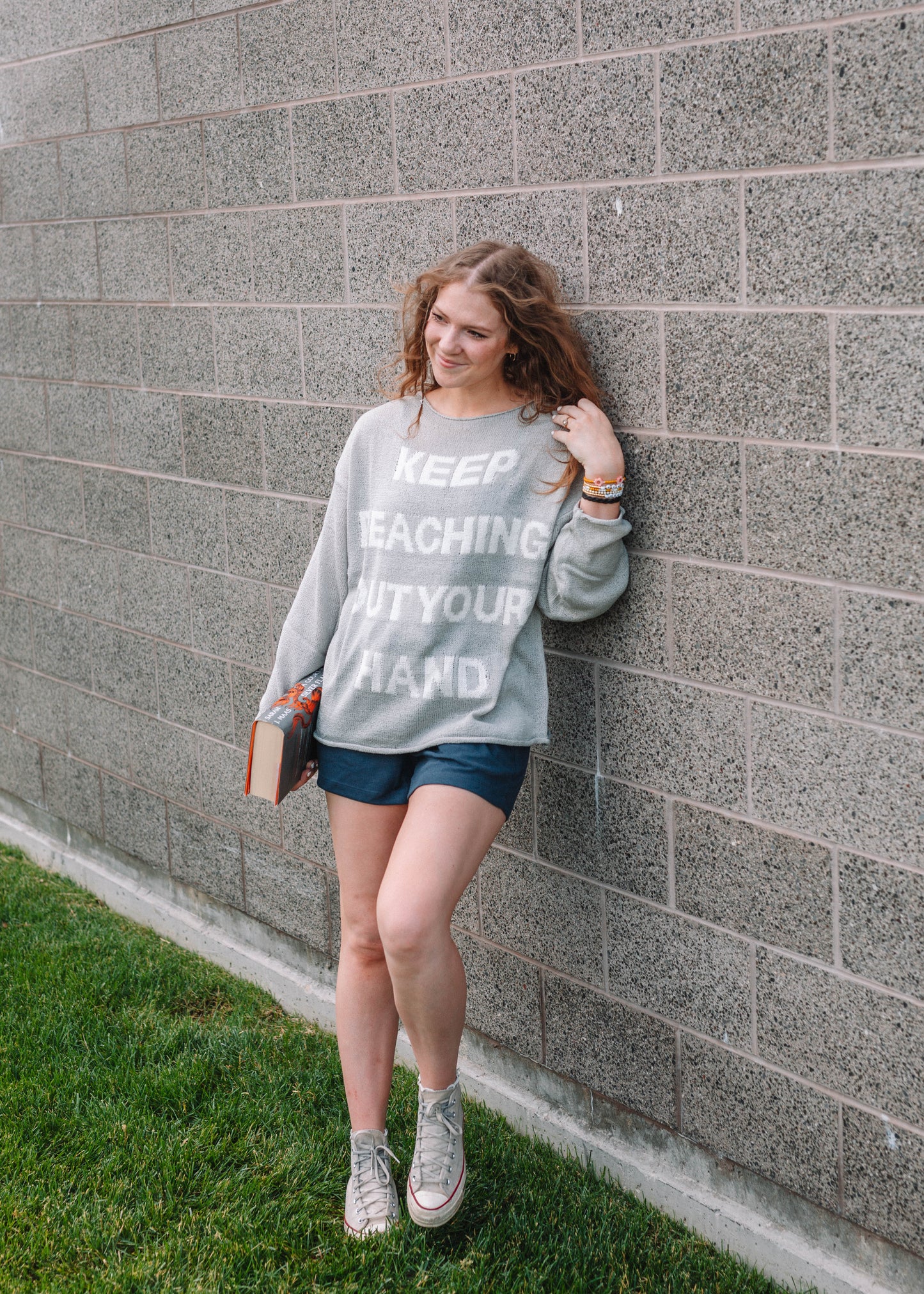 keep reaching out your hand sweater