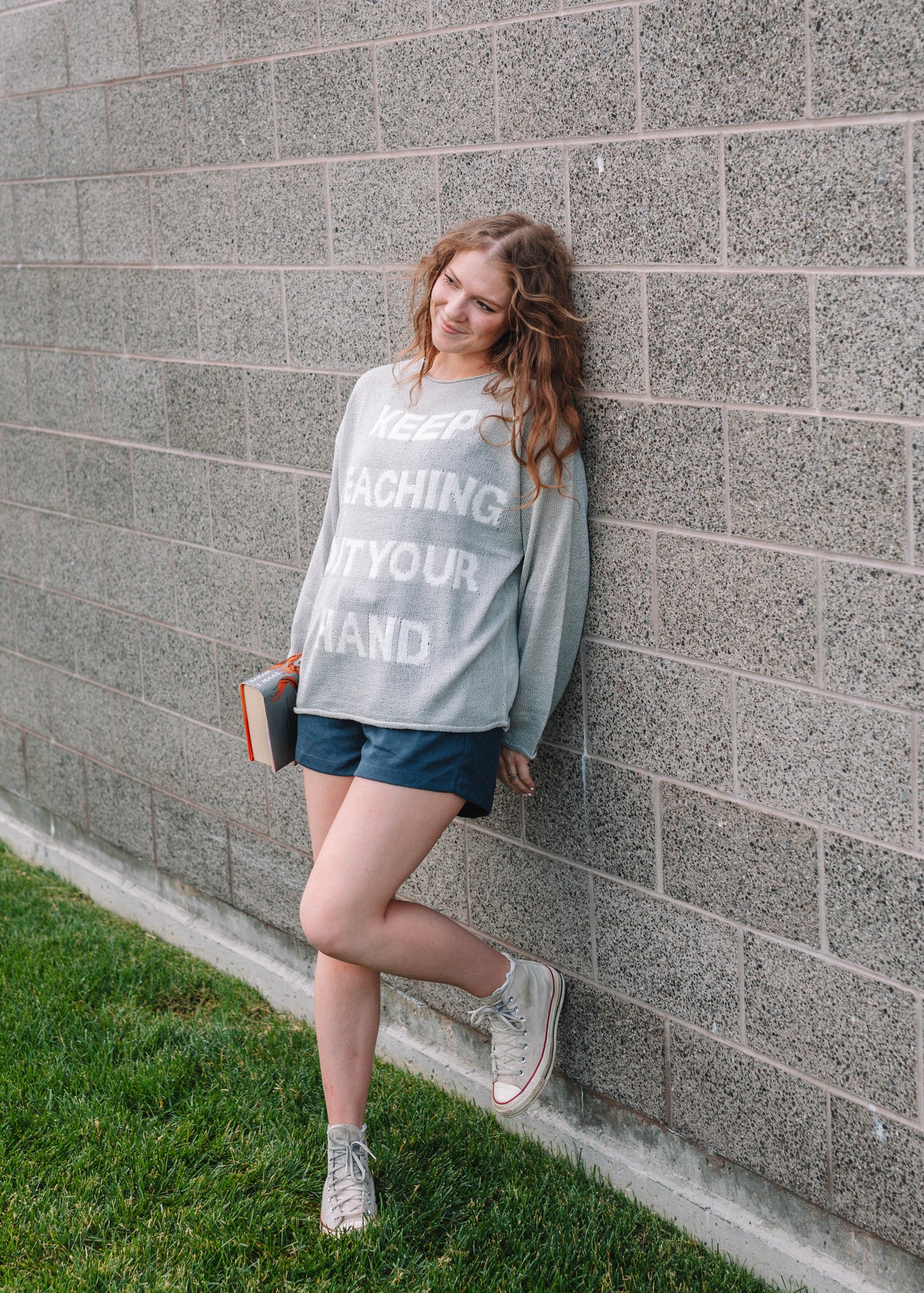 keep reaching out your hand sweater