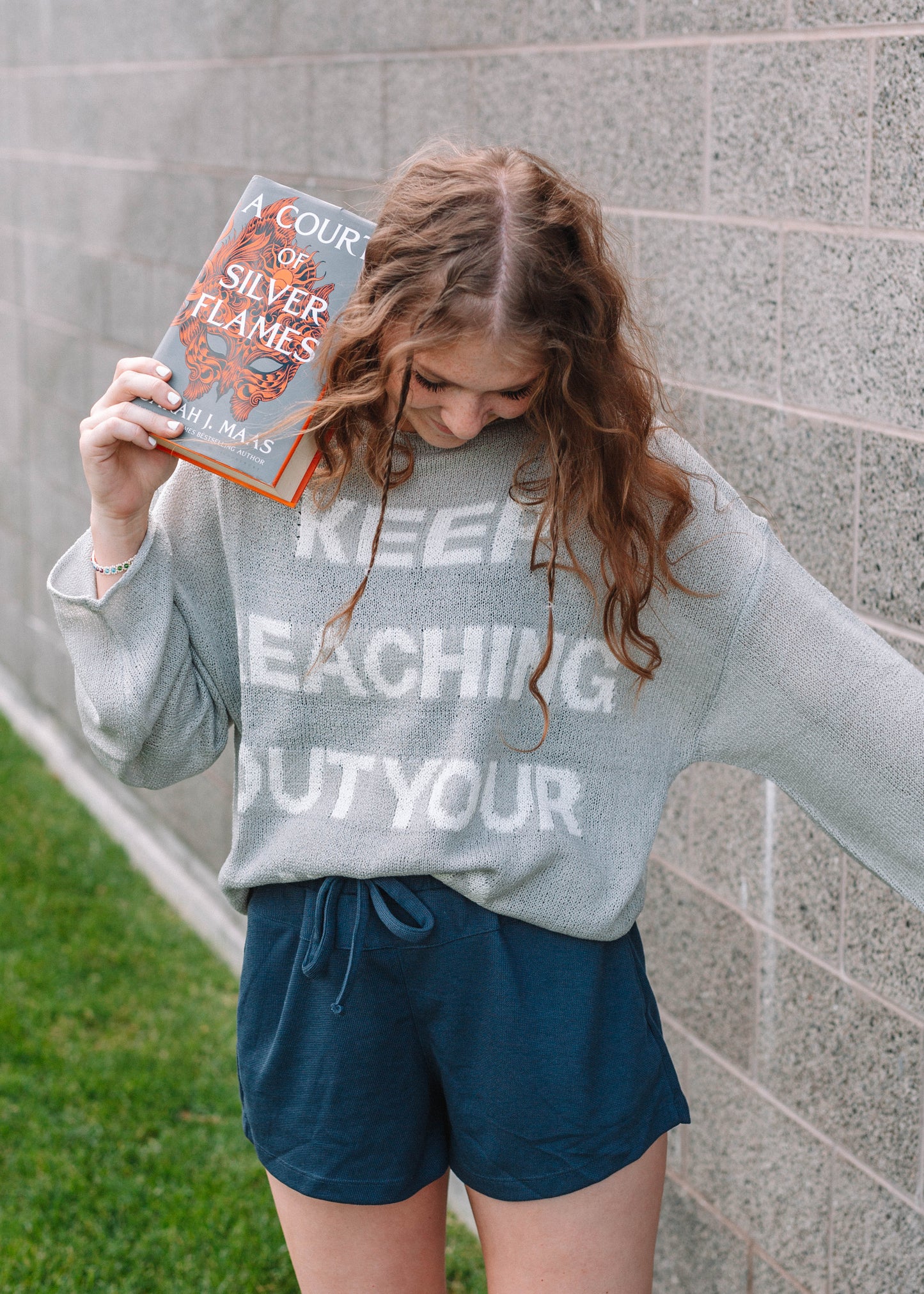 keep reaching out your hand sweater