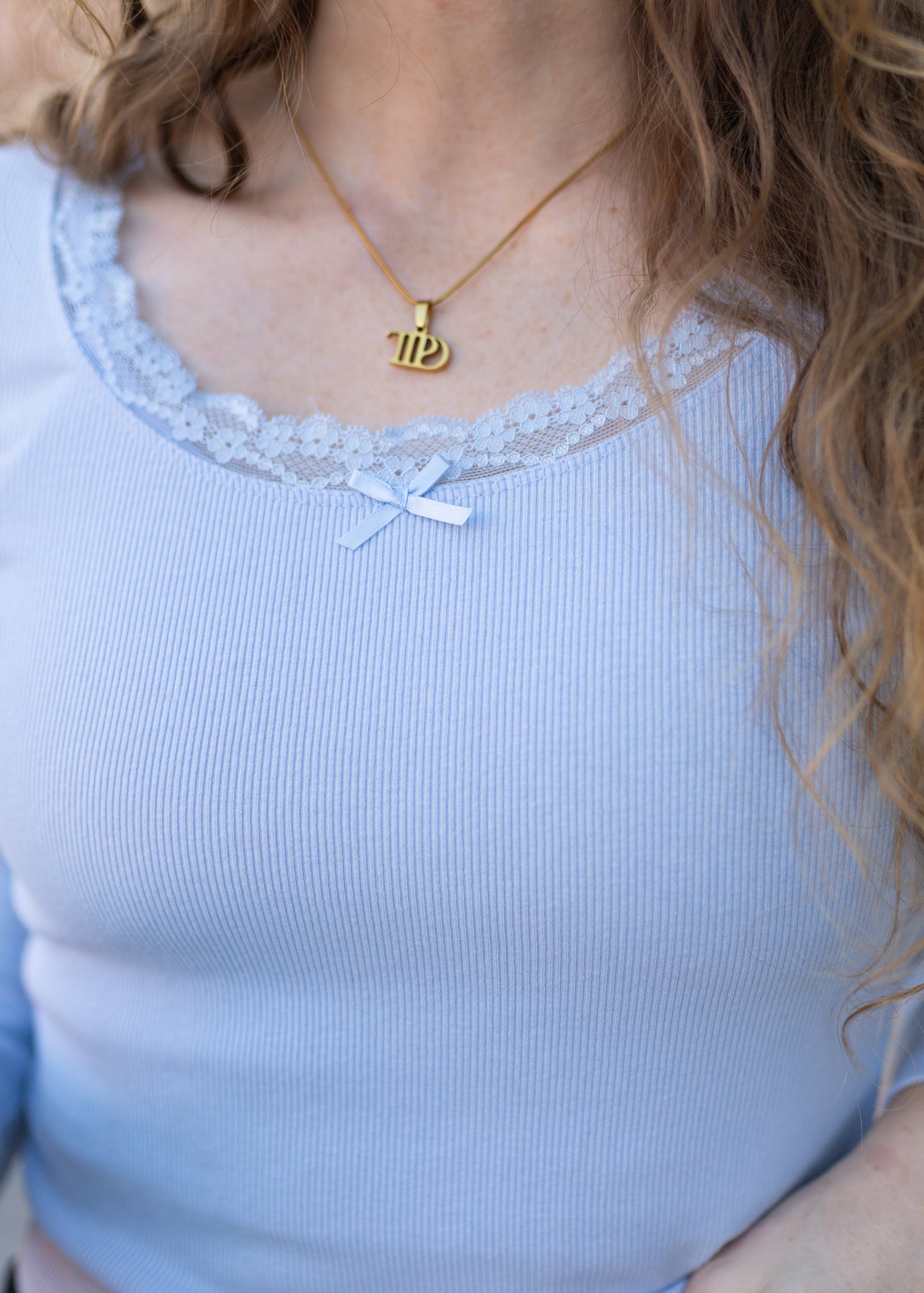 only angel pointelle top in blue