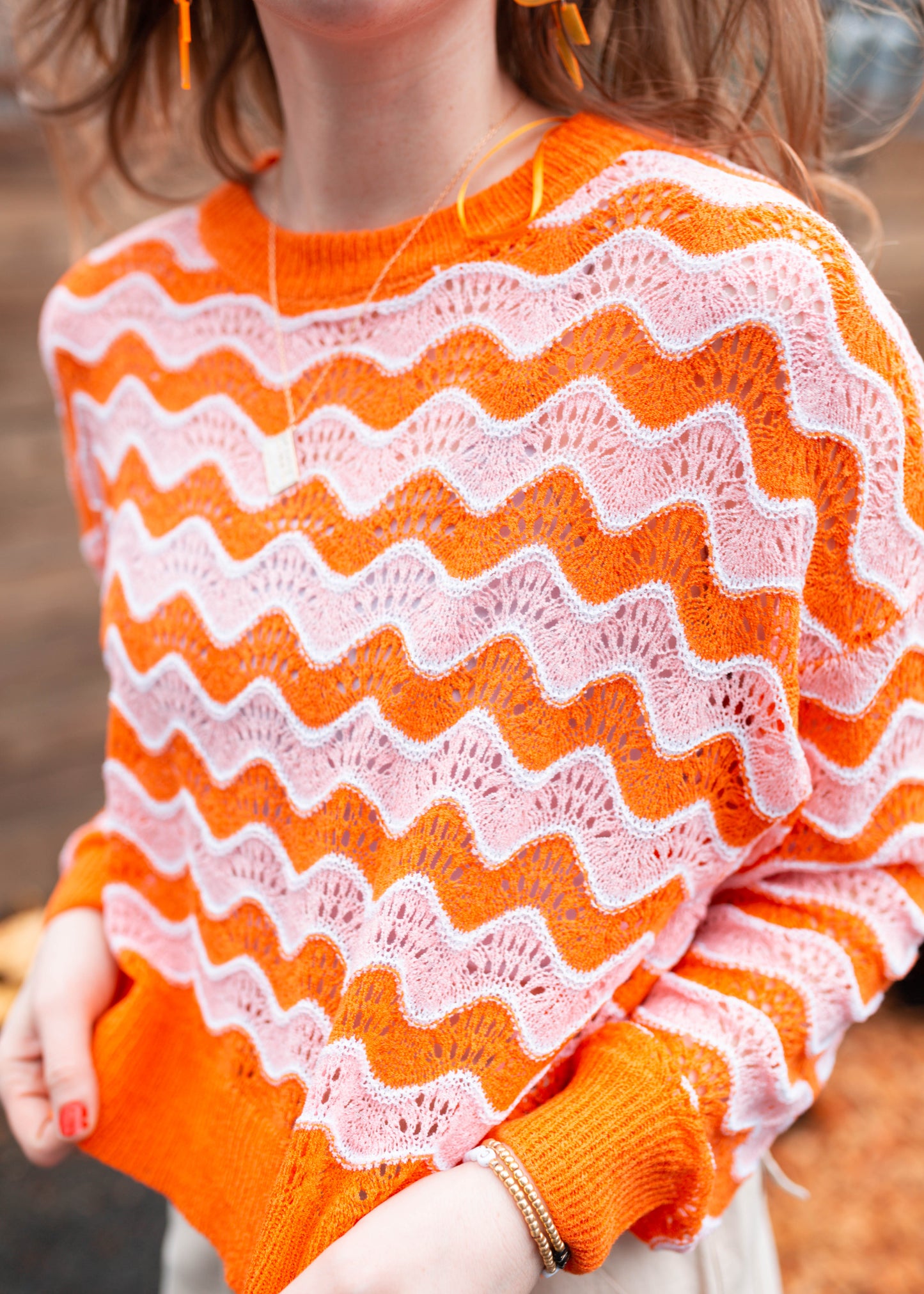 silver trio sweater in orange burst